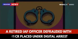 Illustration of handcuffs on a digital screen representing cybercrime against a retired IAF officer defrauded of ₹1 crore and placed under digital arrest
